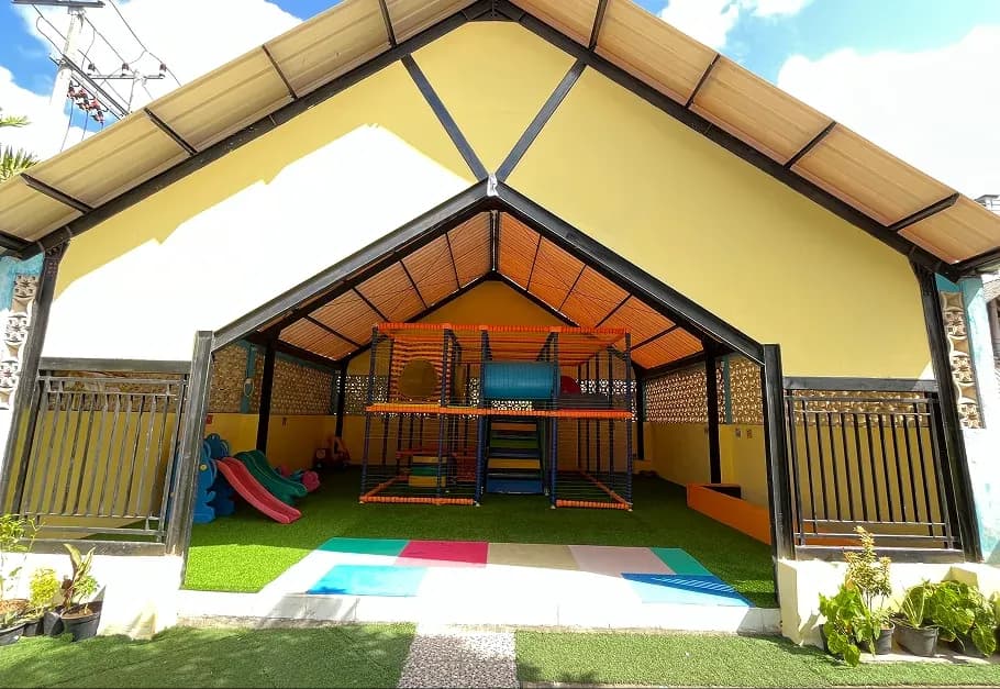 school indoor playground, kids play area, kindergarten playground facility.