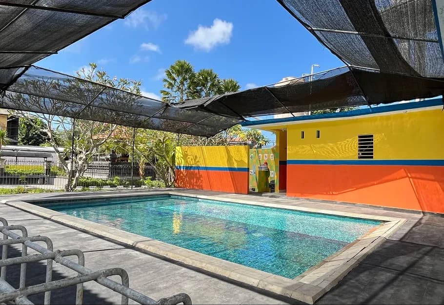 indergarten swimming pool, preschool kids pool, school aquatic play area.